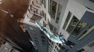 Illustration for article titled Horrifying Skyslide Will Be 1,000 Feet in the Air on the Outside of a Building